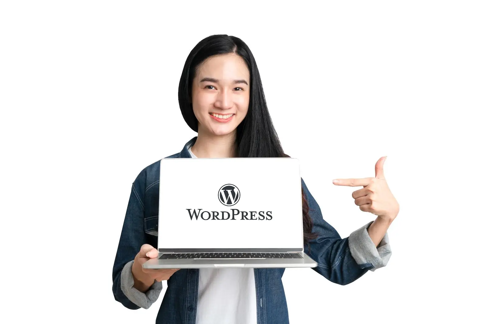 Woman holding a laptop with a WordPress sign